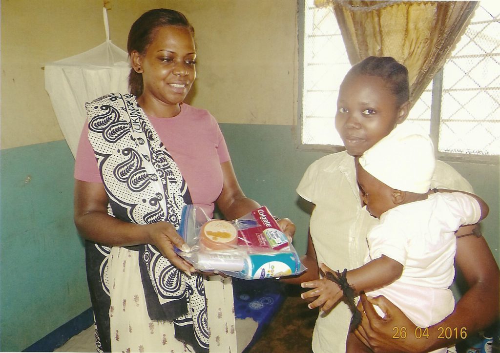 Neema Rashidi (17) with her daughter, Lailati (4-months-old)